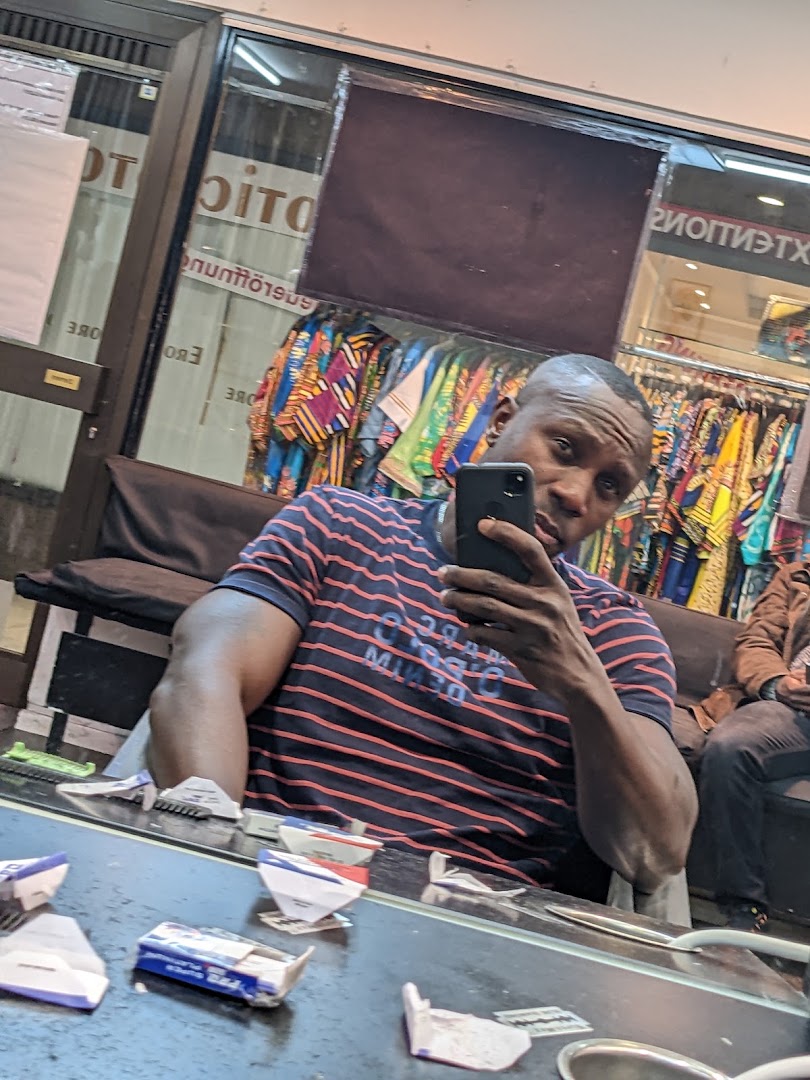 Mallams African American Barber Shop & Cosmetics